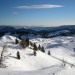 Na vrhu Velike planine pogled na pastirske stane v ozadju Golte, Rogatec, Lepenatka, Menin