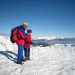 Hari in Lojzka na vrhu Mrežc, v panorami Karavank in Kamniških Alp