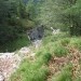 ki strmo pada proti Beli