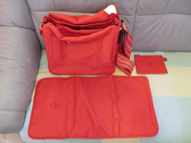 Previjalna torba Lassig rdeča