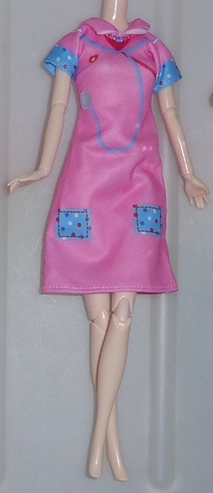 Oblačilca za Barbie barbike - foto