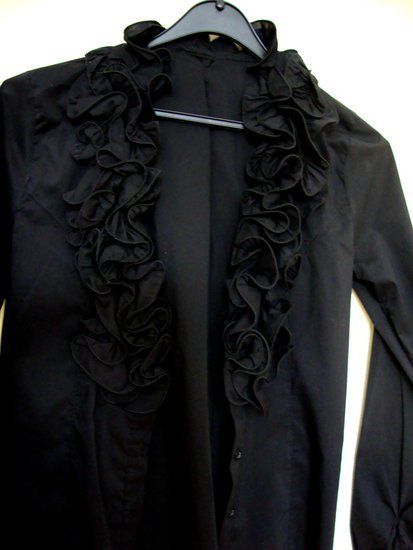 Elegantna črna bluza - foto