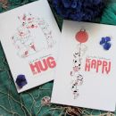 32. Set zvezkov Hug Me in Be Happy, A4, mali karo   IC = 4 eur